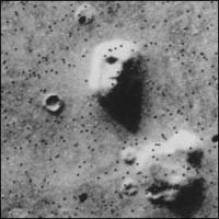 Picture of face-like rock formation on Mars taken by spacecraft from Earth